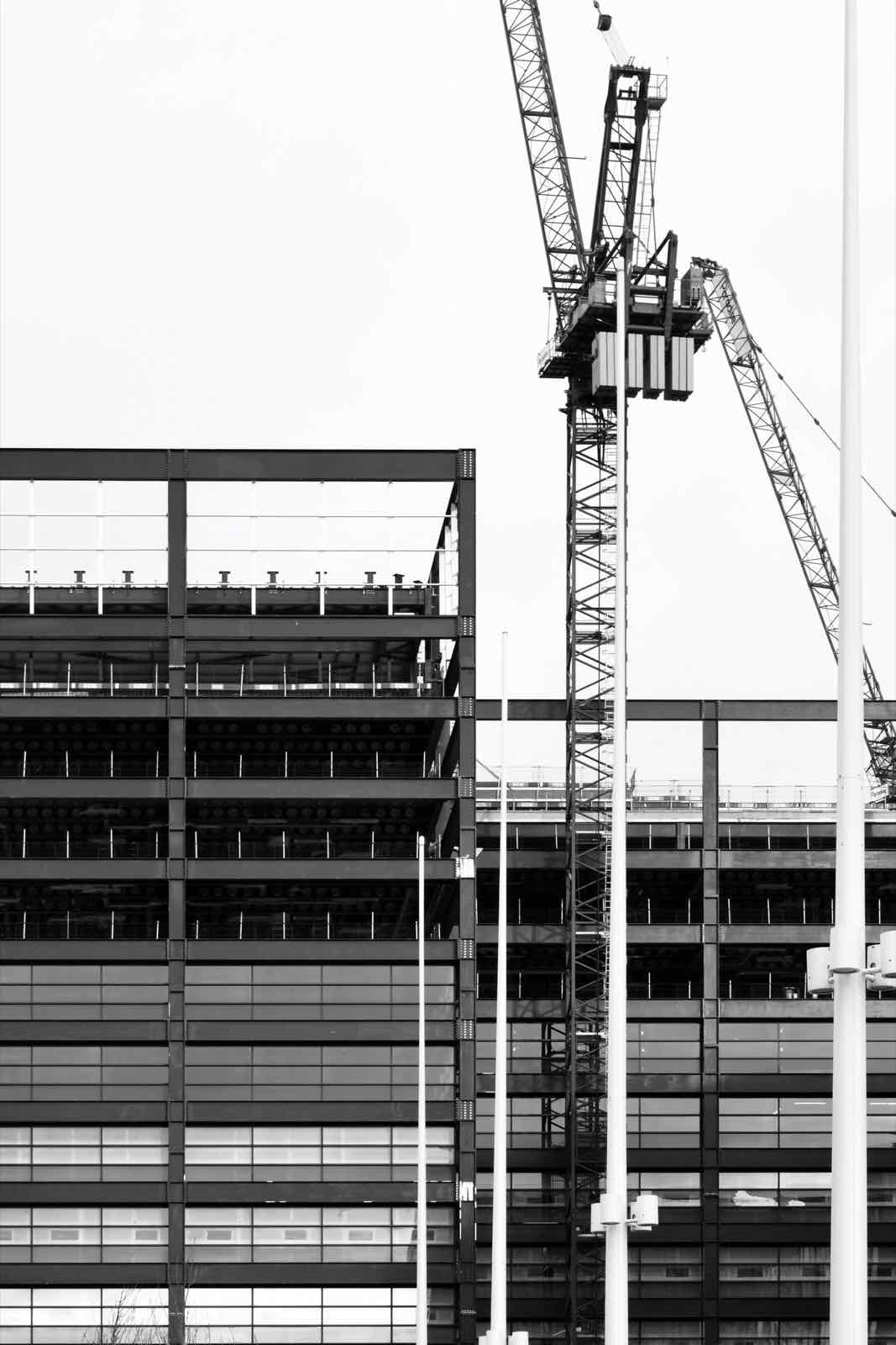 Tower cranes over a city construction site